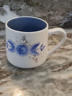 White Ceramic Mug with Blue Interior and Moon Phase Design